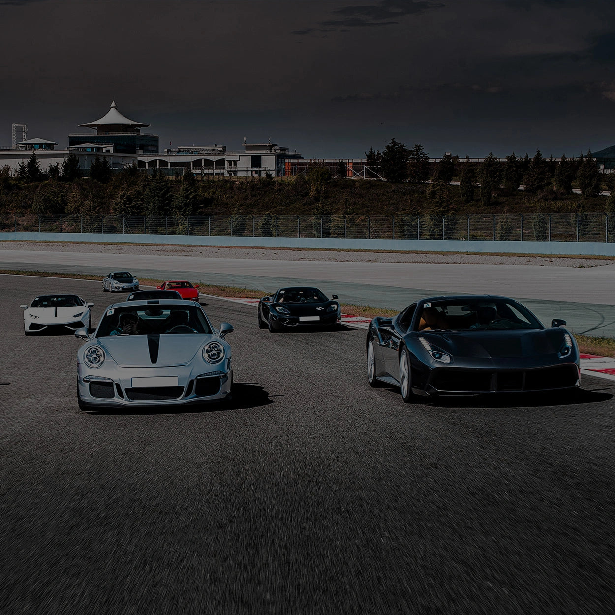 Cars on a race track demonstrating the use of laser cutting for the automotive industry