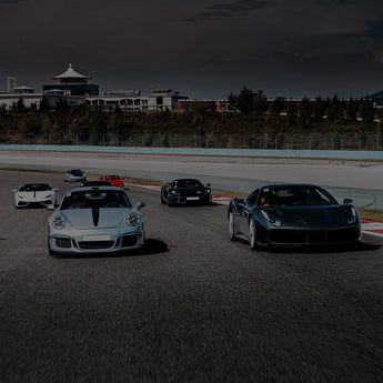 Cars on a race track demonstrating the use of laser cutting for the automotive industry