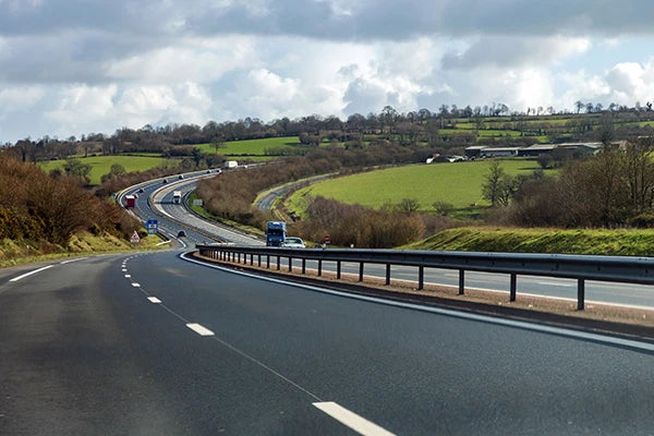 Image of UK highways with scenic country backgrounds.