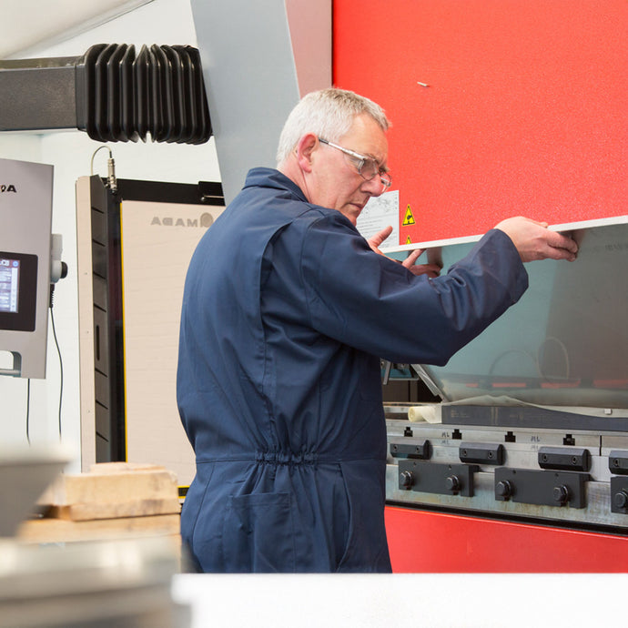Engineer Operating Amada Press Brake Machine