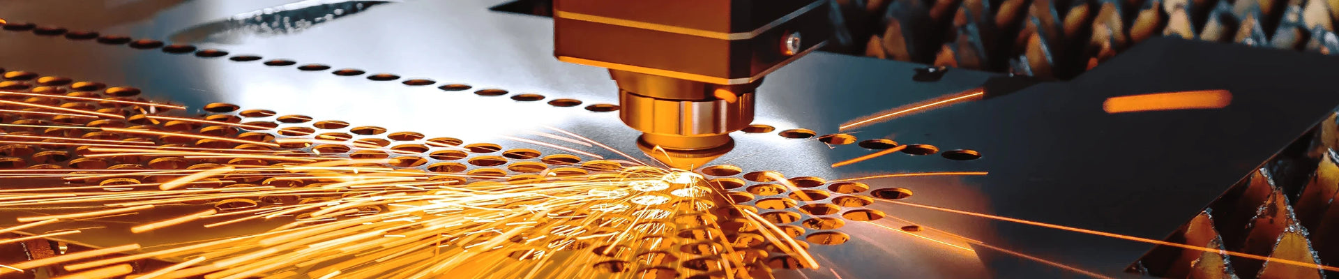 CNC machine cutting metal with sparks flying