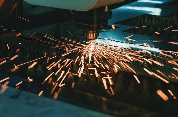 Flat Fiber laser cutting metal sparks